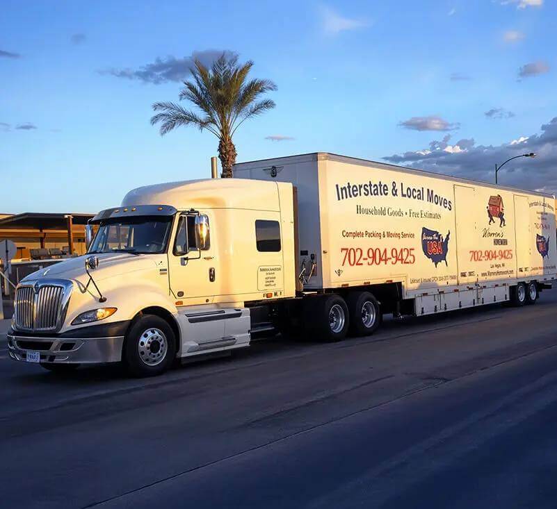 Company box truck with phone number on the side